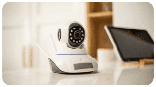 a modern cctv camer on a office desk
